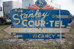 The historic Stanley Cour-Tel sign
